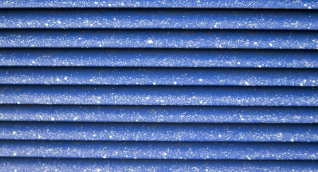 Blue venting element close up photo. Outside view, painting with a lot of white drops.の写真素材