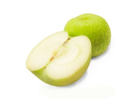 Green apple on white isolated with half cutting piecesの写真素材