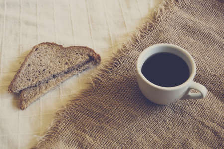 cinnamon bread and cup of teaの写真素材