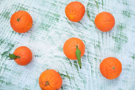 juicy clementines on a wooden backgroundの写真素材