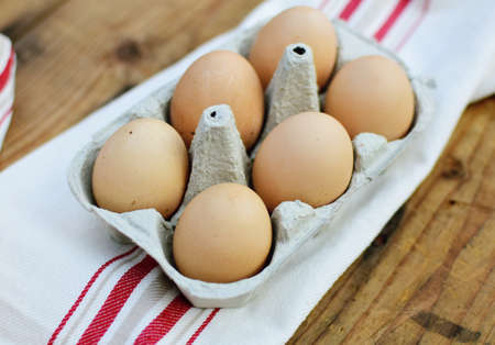 chicken eggs in carton egg boxの写真素材