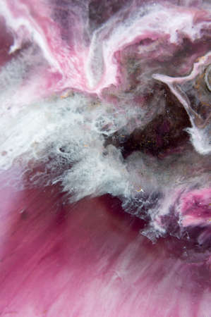Epoxy resin art. Abstract composition. Macro photo. can be used as a trendy background for wallpapers, posters, cards, invitations, websitesの写真素材