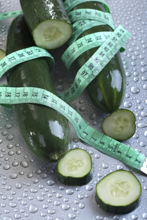 cucumber with tape measureの写真素材