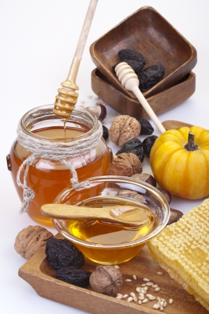 honey, nuts and prunesの写真素材