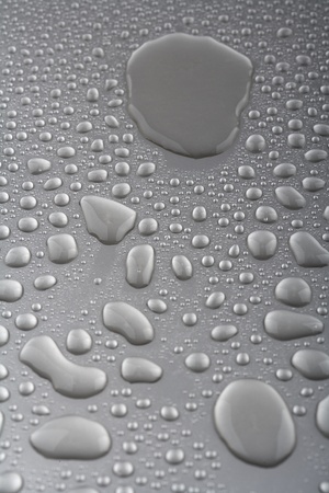 water drops on metalilc surfaceの写真素材