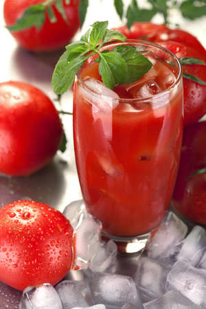 Tomato juice with basil, on iceの写真素材