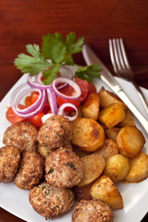 meatballs served with potatoesの写真素材