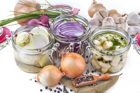 Domestic onion, garlic and red onion preserved in jars