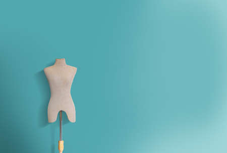 fashion dummy on turquoise background with Space for text, idea concept, designer conceptの写真素材