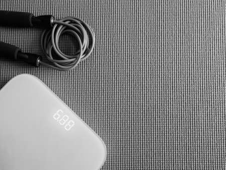 top view of Fitness equipment with Gym Outfit, dumbbells, Sweatband and accessoriesの写真素材