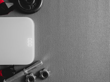 top view of Fitness equipment with Gym Outfit, dumbbells, Sweatband and accessoriesの写真素材