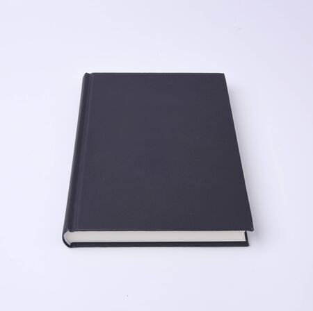 A black covered bookの写真素材