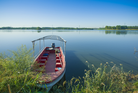 Boat on small lakeの写真素材