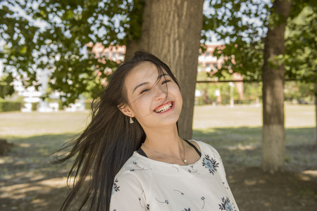 Beautiful Asian college student portraitの写真素材