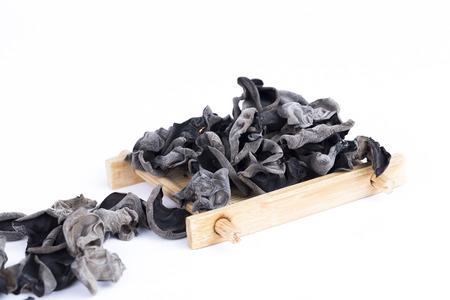 Dried chinese black fungus on the white backgroundの写真素材