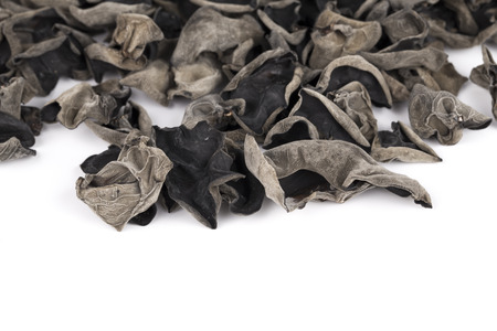 Dried chinese black fungus on the white backgroundの写真素材