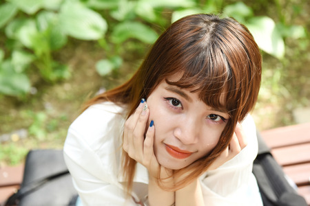 Beautiful girl looking at lensの写真素材