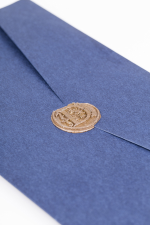 Mail envelope or letter sealed with wax seal stamp on white background