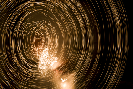 Yellow lines light on the blackgroundの写真素材