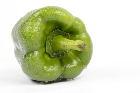 Fresh Green bell pepper on white background.の写真素材