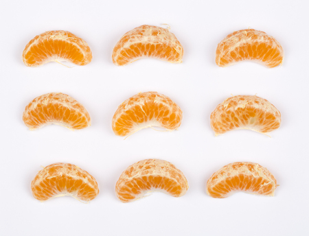 Top view of peeled mandarin isolated on white background.の写真素材