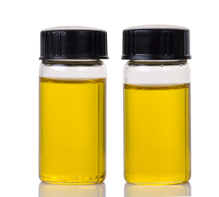 Essential oil on the white background