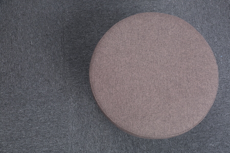 Top view of stool sitting on gray floor.の写真素材