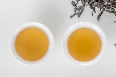 Top view of tea on the white bckground.の写真素材