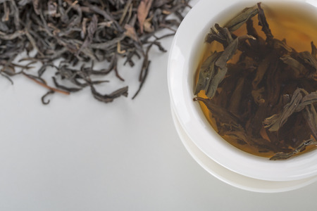 Hot tea on the white table.
