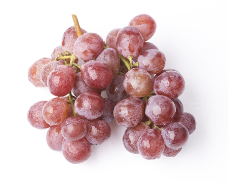 Bunch of ripe red grapes with water drops isolated on white backgroundの写真素材