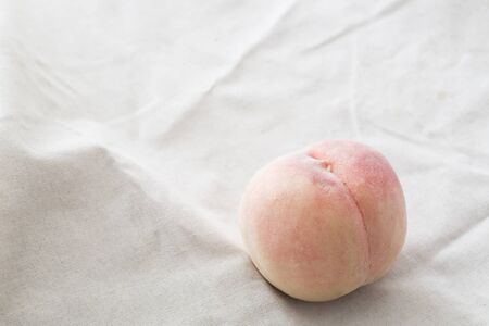Fresh peach on the table close up view