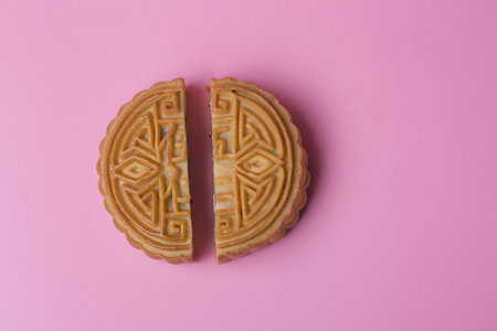 Mooncake on the pink background. Chinese traditional food.の写真素材