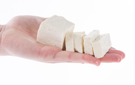 Tofu on the chef's handsの写真素材