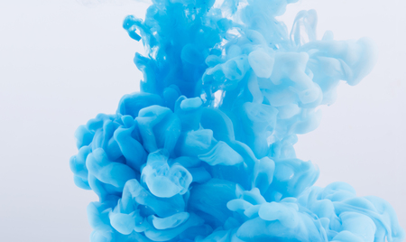 Acrylic blue color in water. Abstract background.の写真素材