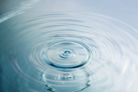 Water drop or water ripples. Waves of rippling water.の写真素材