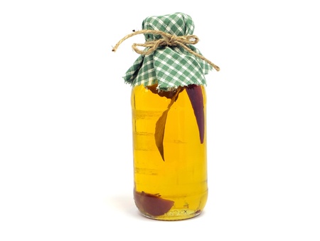 bottle of chilli oil on white backgroundの写真素材