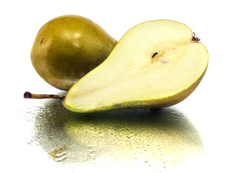 Brown pear on a white background with water drops    の写真素材