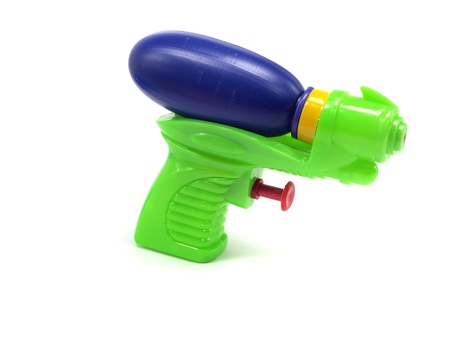 plastic water gun on a white backgroundの写真素材