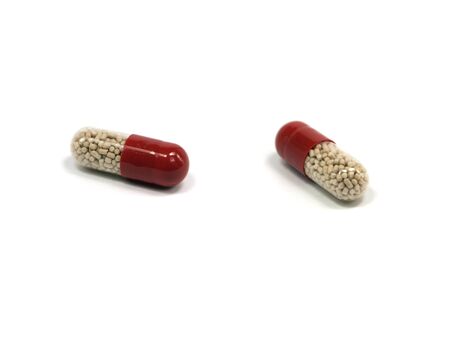pharmaceutical capsules on a white background 
の写真素材