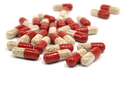 pharmaceutical capsules on a white background 
の写真素材
