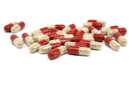 pharmaceutical capsules on a white background 
の写真素材