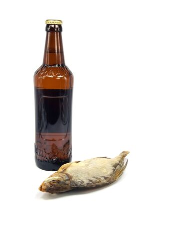 Bottle of beer with dryed fish on a white background
    の写真素材