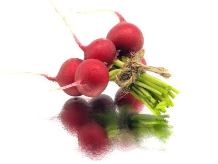 bunch of fresh radish on a white background with water drops
  の写真素材