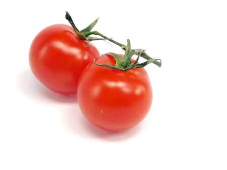 bunch of fresh cherry tomato on a white background 
   の写真素材