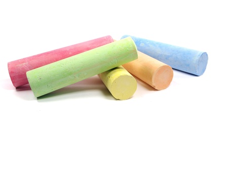 chalks in a variety of colors arranged on a white background 
 の写真素材