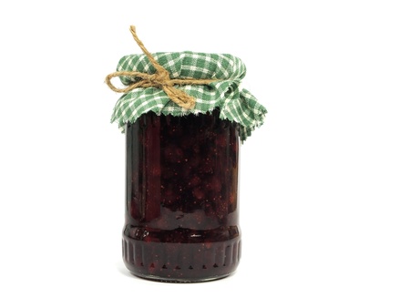 strawberry jam in glass jar on white background 
の写真素材