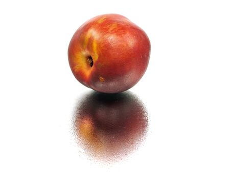 nectarines on a white background with water drops
 の写真素材