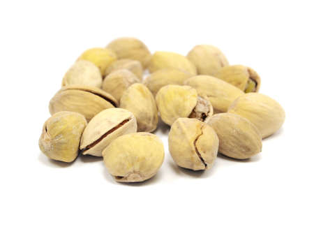 pistachios nuts stack on a white background 
 の写真素材