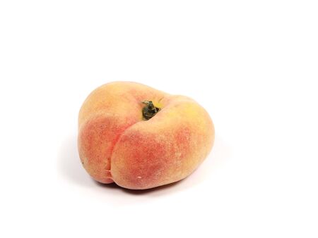 Exotic flat peach on a white backgroundの写真素材