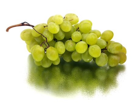 bunch of green grapes on a white background with water drops 
   の写真素材